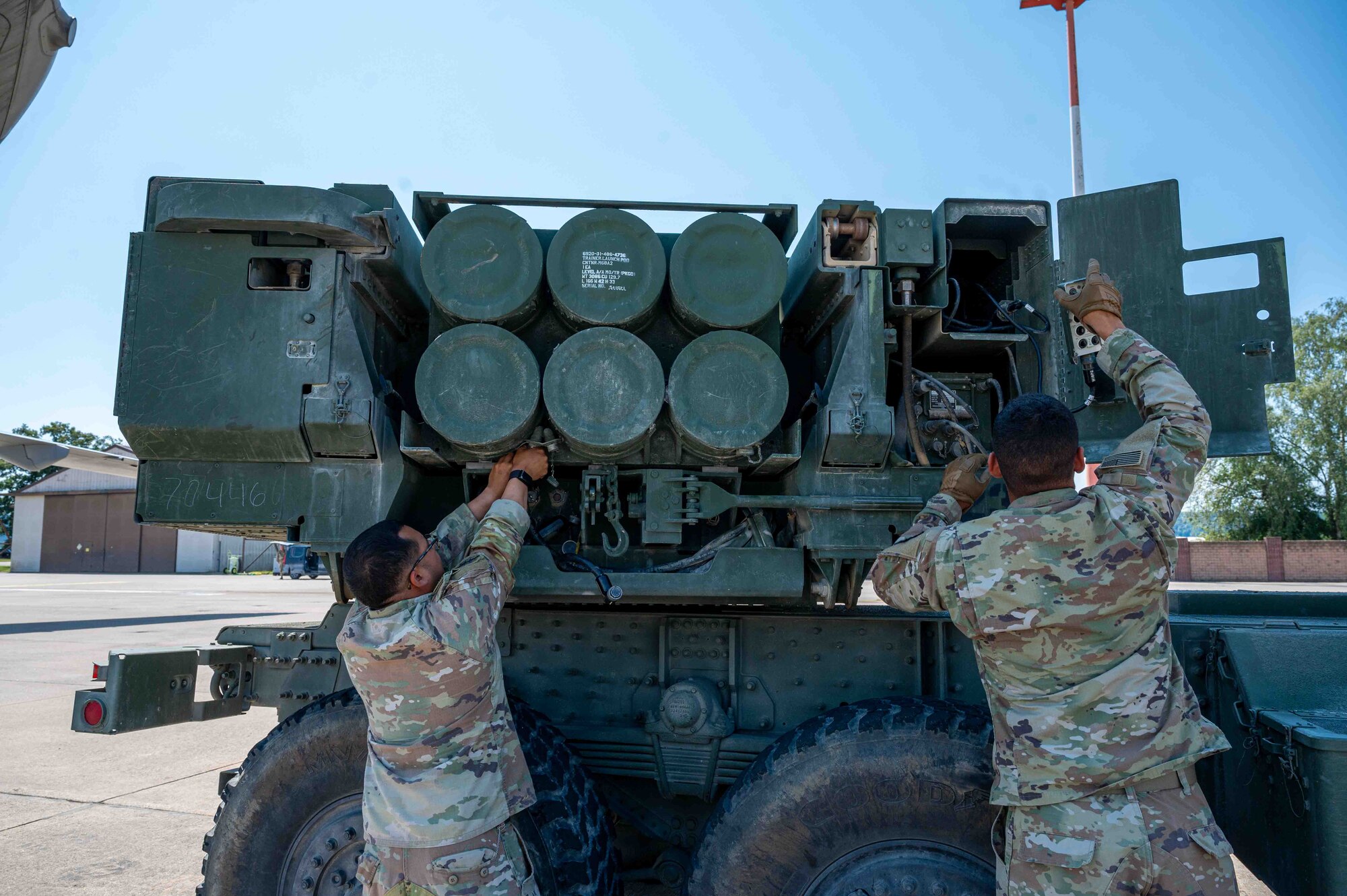 U.S. Soldiers with the 4-133rd Field Artillery Regiment conduct a check on an M142 High Mobility Rocket System during cold load training