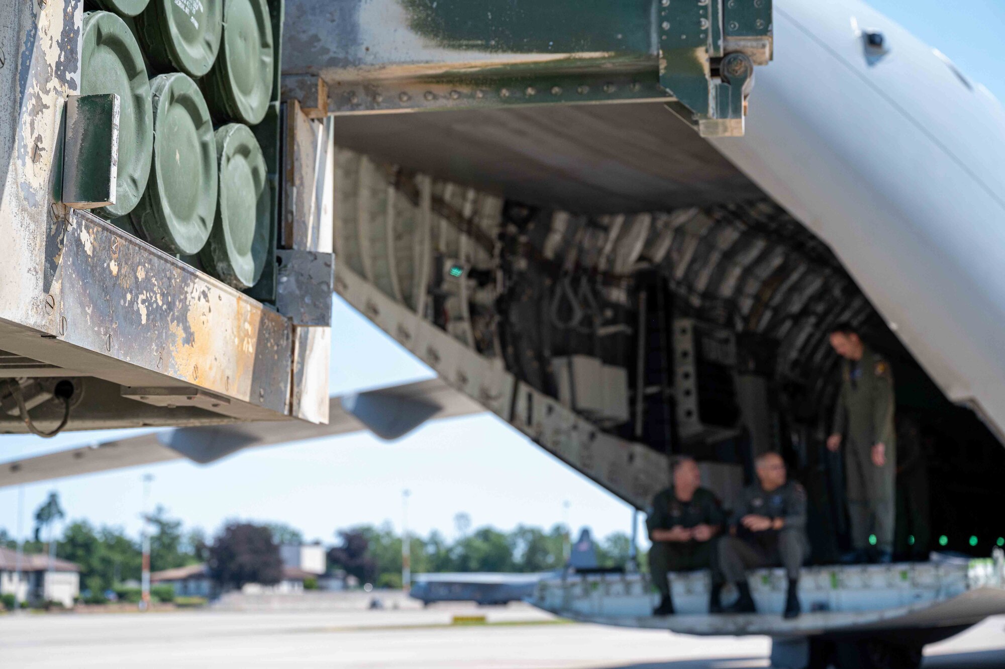 Portuguese Air Force 506th Squadron service members talk after cold load training