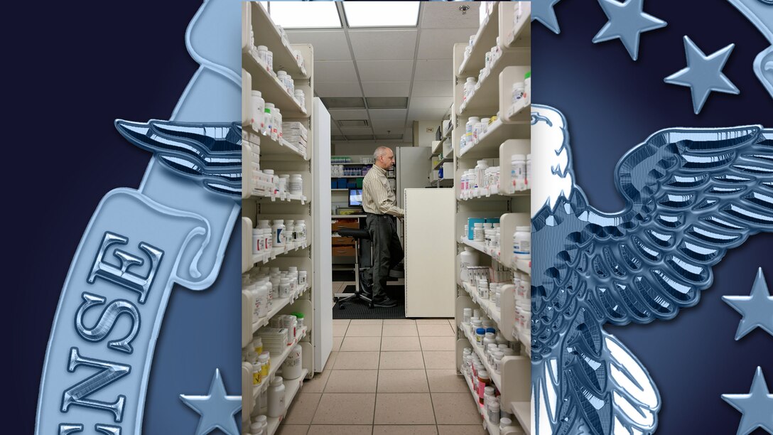 Michael Garnick, 31st Medical Group pharmacist, reviews prescriptions at his computer at Aviano Air Base, Italy, June 12, 2024. The base pharmacy integrates with local pharmacies to ensure around-the-clock medication availability for the base populace.