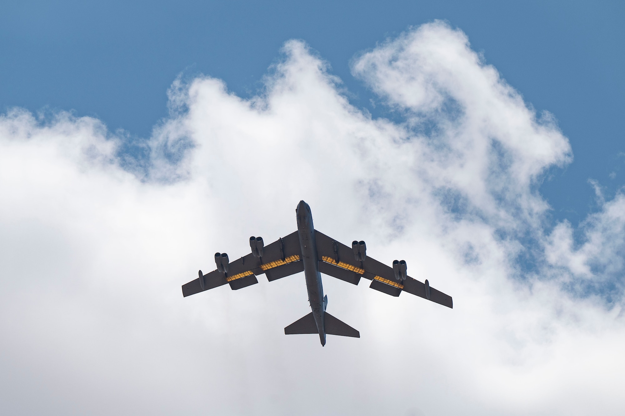 A B-52 Stratofortress assigned to the 23rd Bomb Squadron at Minot Air Force Base, North Dakota, flys over Dyess Air Force Base, Texas, July 15, 2024. Several B-52s and Airmen from Minot AFB came to Dyess AFB to participate in an Agile Combat Employment exercise, dubbed Agile Warbird. (U.S. Air Force photo by Airman 1st Class Emma Anderson)