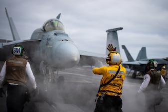 An F/A-18E Super Hornet from VFA-137 prepares to launch from the USS Nimitz (CVN 68) during flight operations in the Pacific Ocean.