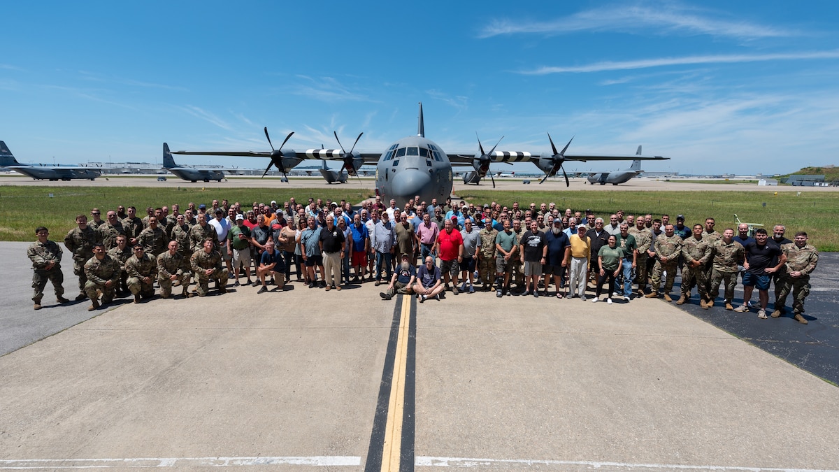 More than 200 current and former members of the Kentucky Air National Guard pose in front of a 123rd Airlift Wing C-130J Super Hercules aircraft at the Kentucky Air National Guard Base on June 28, 2024, during a luncheon to celebrate the unit’s heritage. The event represented more than 3,000 years of aircraft maintenance experience. (U.S. Air National Guard photo by Phil Speck)