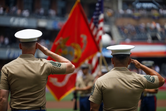 U.S. Marines with Marine Corps Installations West Marine Corps Base Camp Pendleton present arms at Petco Park Stadium, San Diego, July 14, 2024. U.S. Marines attended the San Diego Padres’ Military Salute to the Marine Corps to honor the commitment of the U.S. Marines and connect with the San Diego community. (U.S. Marine Corps photo by Sgt. Patrick King)