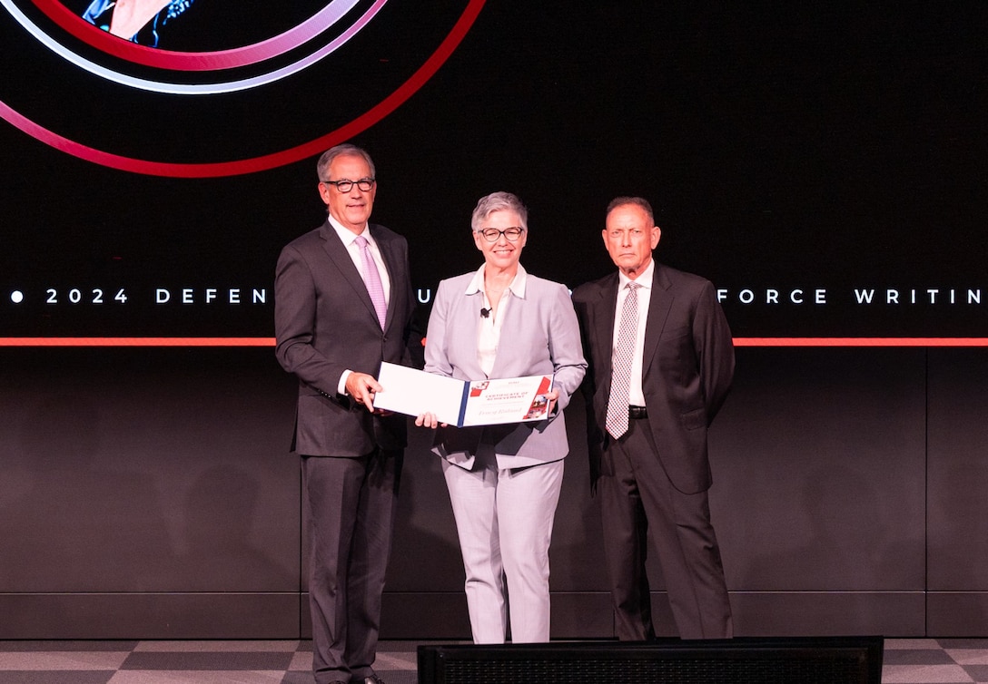 DLA employees win two of six writing awards from Defense Acquisition University.
