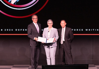 DLA employees win two of six writing awards from Defense Acquisition University.