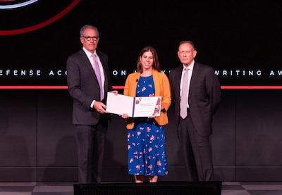 DLA employees win two of six writing awards from Defense Acquisition University.
