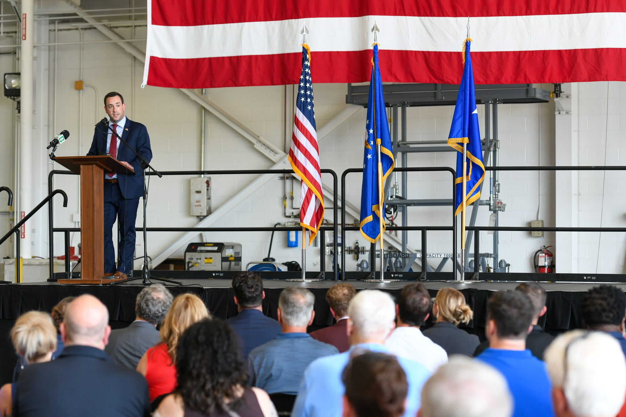Josh Prest, executive director of the Eastern Ohio Military Affairs Commission, speaks at an arrival ceremony celebrating the 910th Airlift Wing’s first C-130J-30 Super Hercules aircraft on July 16, 2024, at Youngstown Air Reserve Station, Ohio.