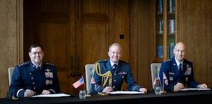 U.S. Space Force Chief of Space Operations Gen. Chance Saltzman, Royal Air Force Chief of the Air Staff Air Chief Marshal Sir Rich Knighton, and U.S. Air Force Chief of Staff Gen. David Allvin sign a Shared Vision Statement on Combined Air and Space Power in the 21st Century at the RAF’s Global Air & Space Chiefs’ Conference in London, United Kingdom, July 17, 2024