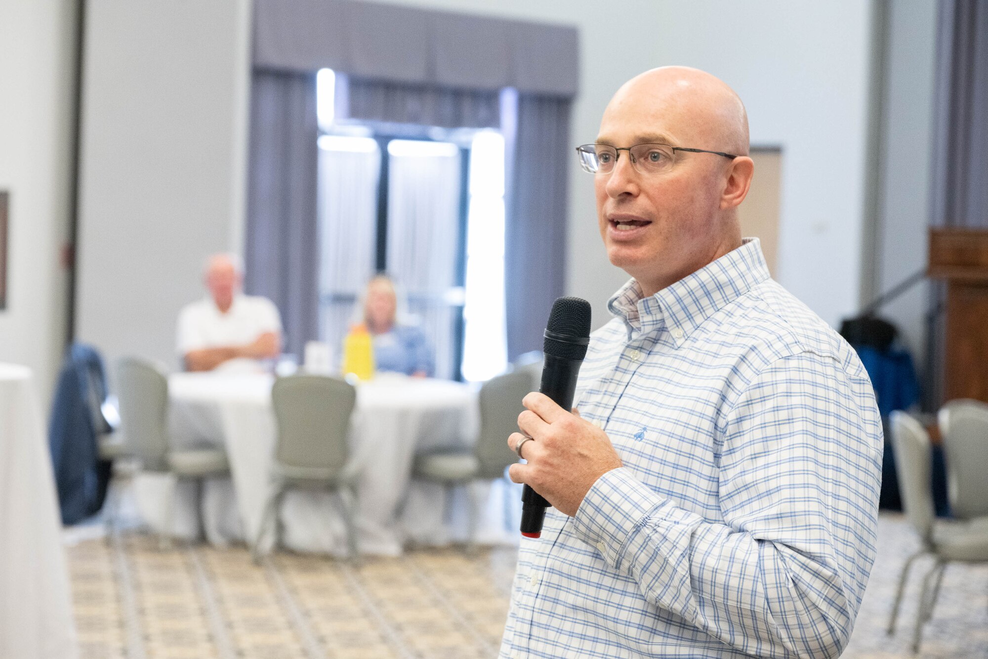 U.S. Air Force Col. Chris McDonald, 436th Airlift Wing commander, gives opening remarks during an Ambassador Program Social at Dover AFB, Delaware, July 16, 2024. The new Ambassador Program is designed with a dual purpose to nurture and maintain enduring relationships between past-HCCs and Dover AFB and to provide a platform for Ambassadors to serve as mentors to current and aspiring HCCs. (U.S. Air Force photo by Mauricio Campino)