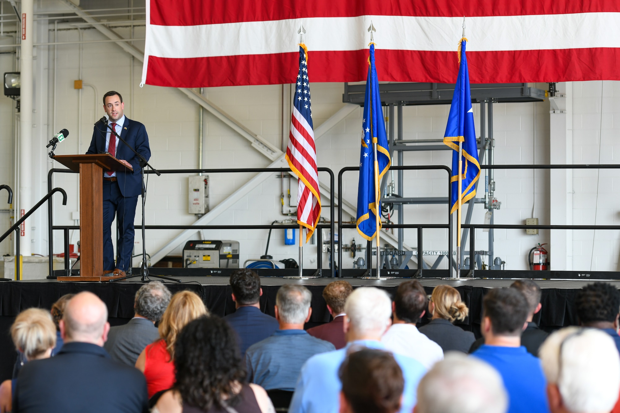 Josh Prest, executive director of the Eastern Ohio Military Affairs Commission, speaks at an arrival ceremony celebrating the 910th Airlift Wing’s first C-130J-30 Super Hercules aircraft on July 16, 2024, at Youngstown Air Reserve Station, Ohio.