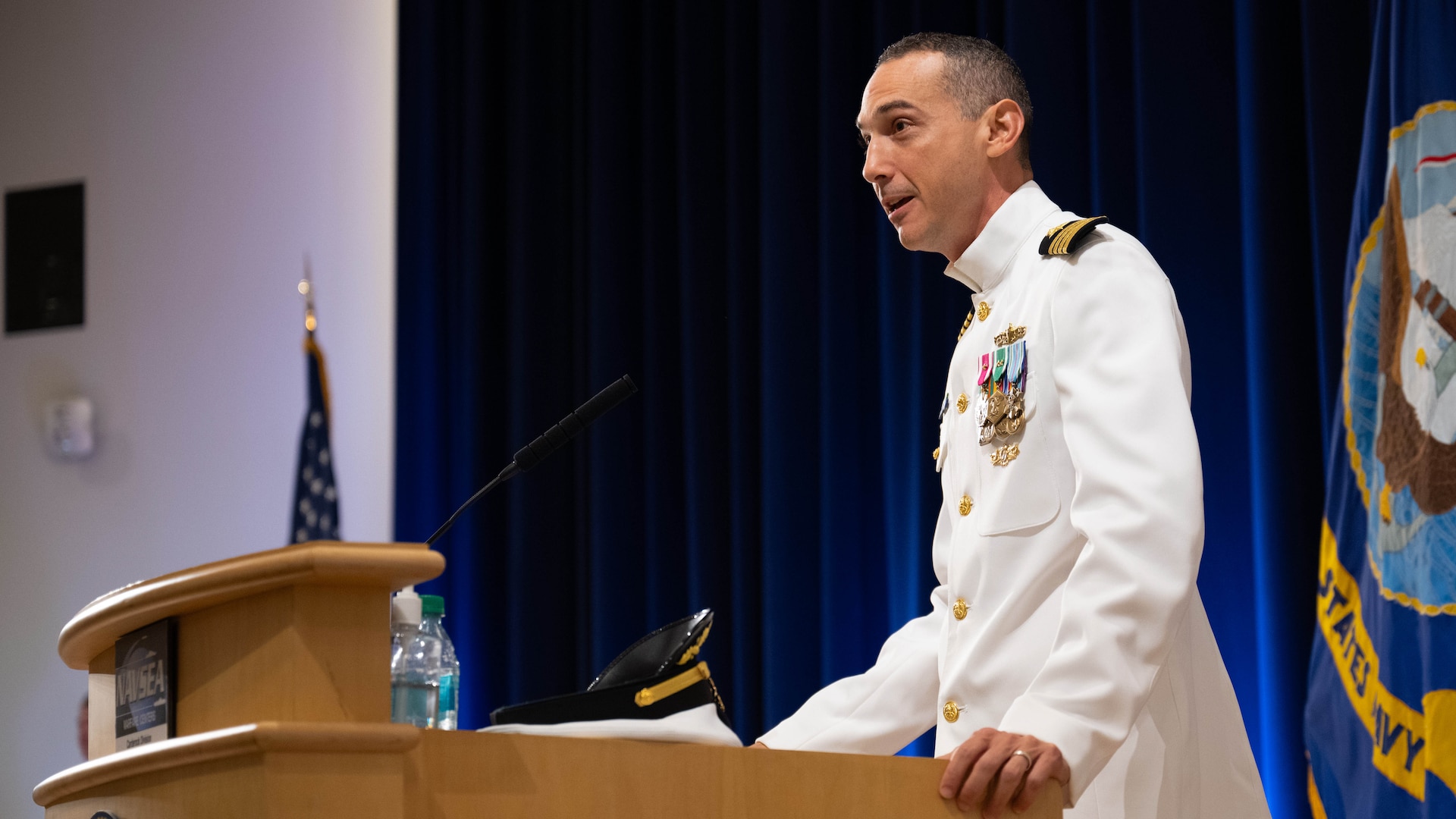 New Carderock Commanding Officer Capt. Christopher Matassa speaks to the workforce after taking charge of Naval Surface Warfare Center, Carderock Division in West Bethesda, Md., on July 17, 2024.