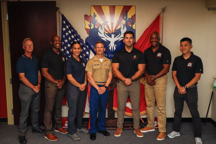 The Commanding General of Marine Corps Marine Corps Recruit Depot San Diego and the Western Recruiting Region, Brig. Gen. James Ryans, Sergeant Major of MCRDSD and the WRR Sgt. Maj. Oranjel Leavy, and their team visited Recruiting Station Phoenix, Ariz., July 8, 2024. During their visit, they received a brief from command members and the officer selection officer on the state of officer recruiting. They also took time to speak to every command group member about their opinions on Marine Corps recruiting overall.  (U.S. Marine Corps photo by Sgt. Symira Bostic)