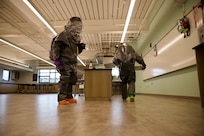Sample team members of the 33rd WMD-CST, District of Columbia National Guard, locate an improvised lab during a training exercise in Lihue, Hawaii, on June 7, 2024. The exercise poised military and civilian response partners to better integrate capabilities when disaster strikes.