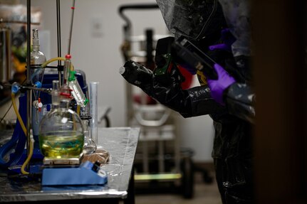 Members of the 33rd Weapons of Mass Destruction-Civil Support Team (WMD-CST), District of Columbia National Guard, inspect an improvised lab during a training exercise in Lihue, Hawaii, on June 7, 2024. The exercise poised military and civilian response partners to better integrate capabilities when disaster strikes.