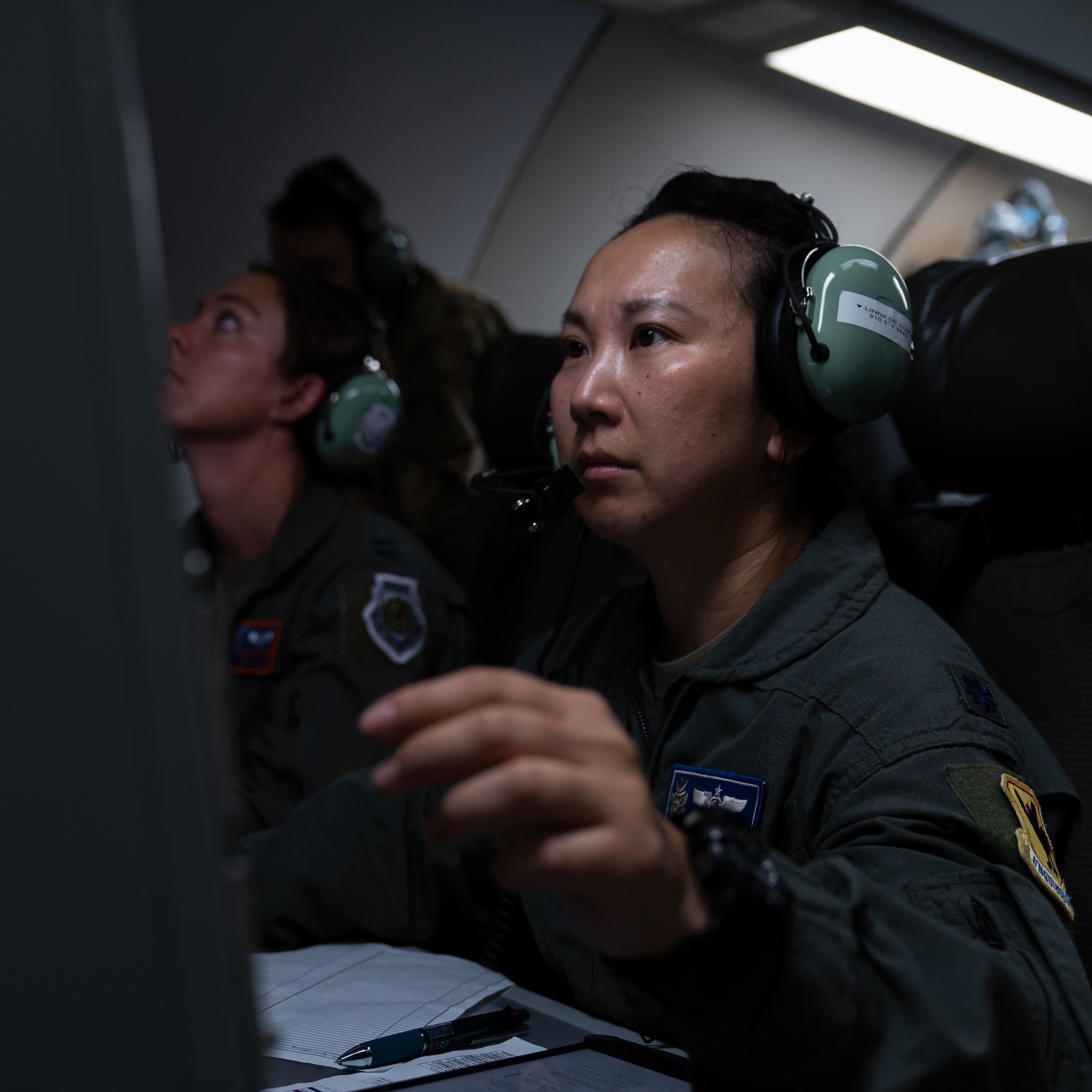 Airman operating AWACS computer