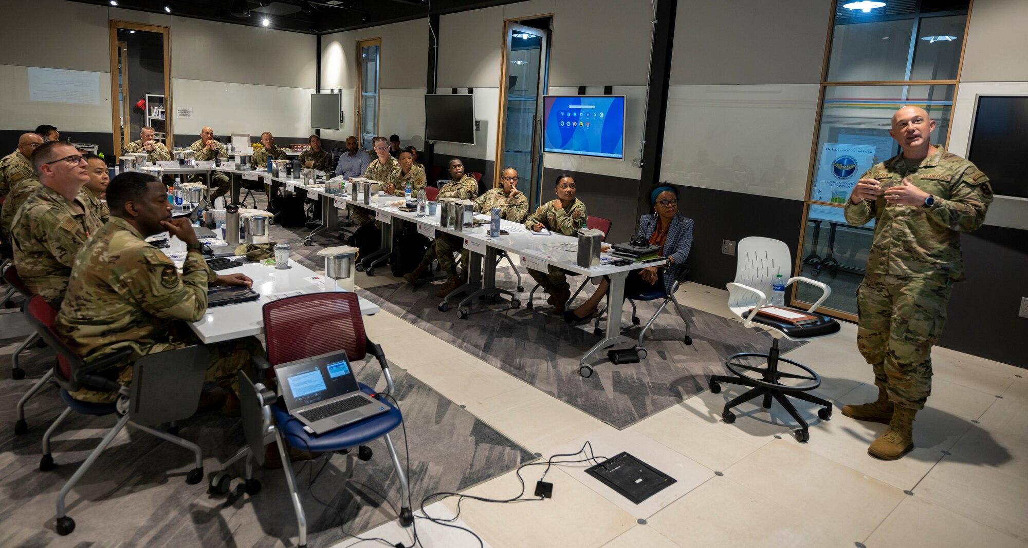 Chief Master Sgt. Stefan Blazier, Air University command chief, briefs a group of enlisted professional military education commandants from around the world, gathered for the 2024 Summer Commandants Conference in Montgomery, Ala., July 8-12. The conference, which included 21 commandants from Air Force noncommissioned officer academies and above, was hosted by the Thomas N. Barnes Center for Enlisted Education and focused on the development of ideas and planning of EPME execution and strategic direction through 2029. (U.S. Air Force photo/Brian Ferguson)
