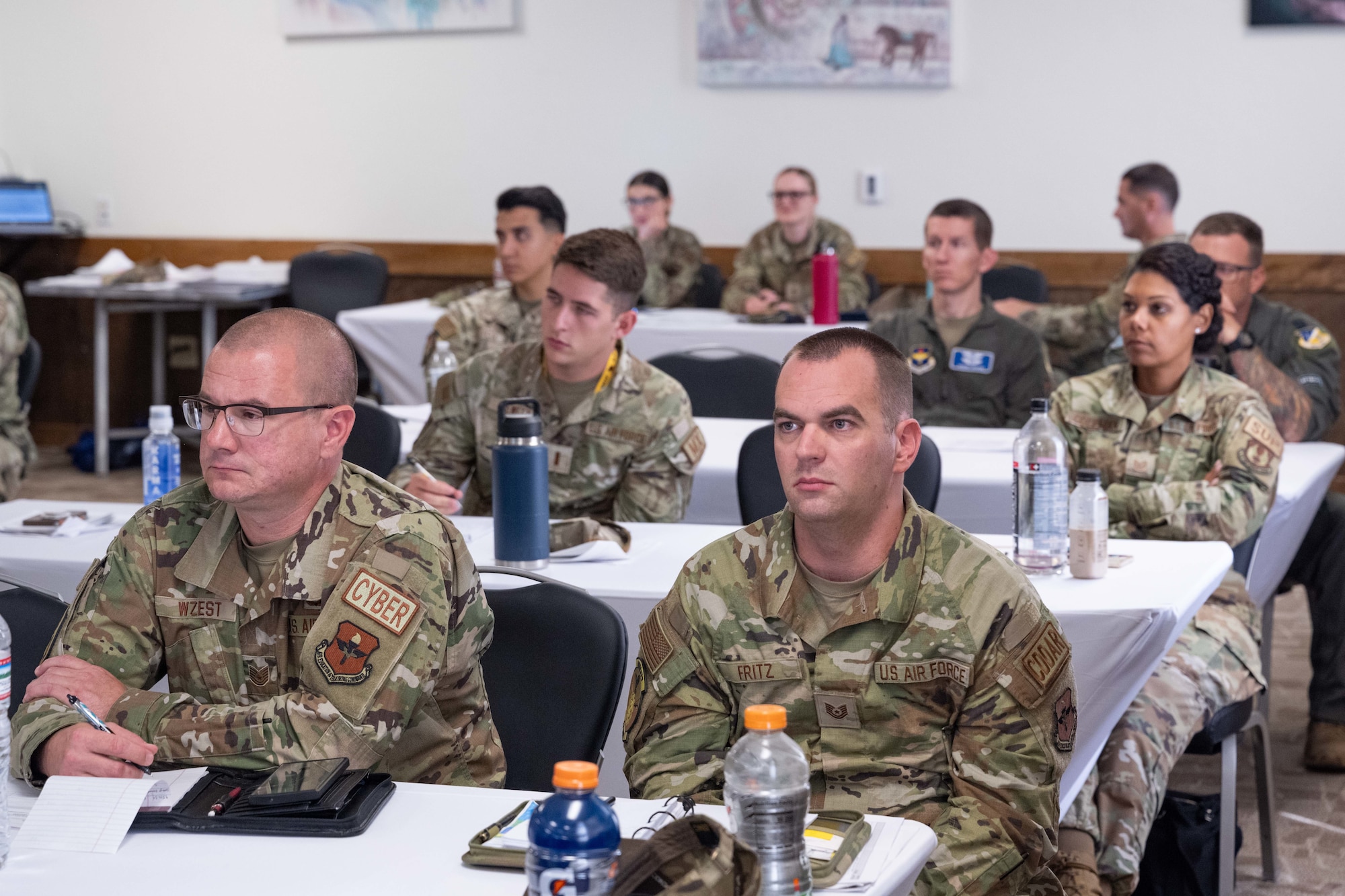 New flight commanders and flight chiefs watch a presentation by senior civilian leaders at the 49er Flight Leadership Course at Holloman Air Force Base, New Mexico, July 9, 2024.