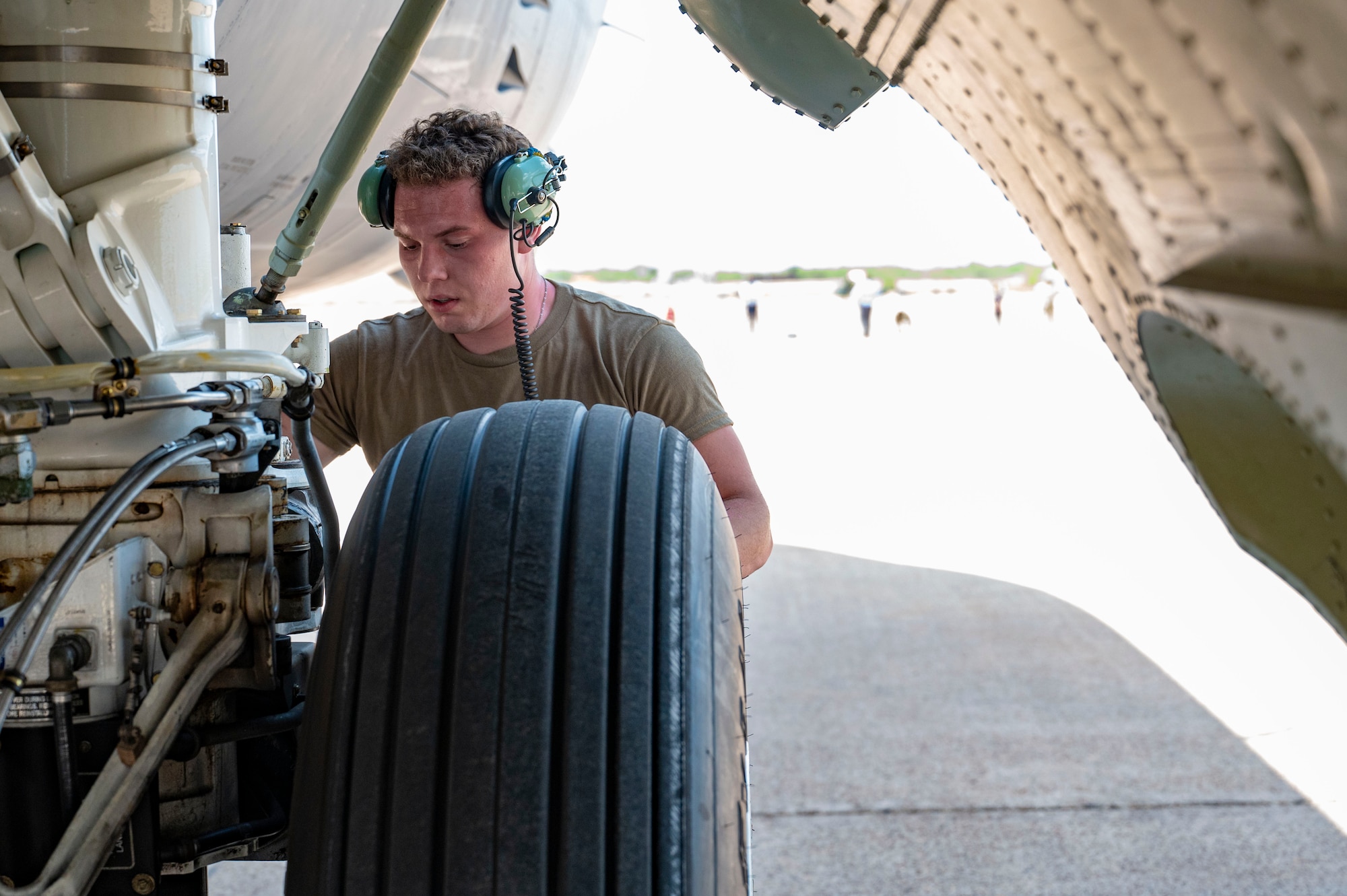 An Airman from Minot Air Force Base, North Dakota, performs post flight maintenance on a B-52 Stratofortress at Dyess Air Force Base, Texas, July 15, 2024. Team Minot will integrate into the 7th Bomb Wing’s daily operations in order to maintain readiness and proficiency and utilize unique training opportunities. (U.S. Air Force photo by Airman 1st Class Emma Anderson)