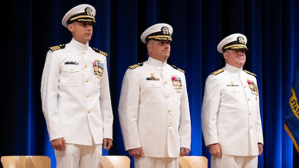 Commander, Naval Surface Warfare Center/Naval Undersea Warfare Center, Rear Adm. Todd Evans (right), former NSWC Carderock Commanding Officer Capt. Matthew Tardy (center), and the new NSWC Carderock Commanding Officer Christopher Matassa (left) stand together.