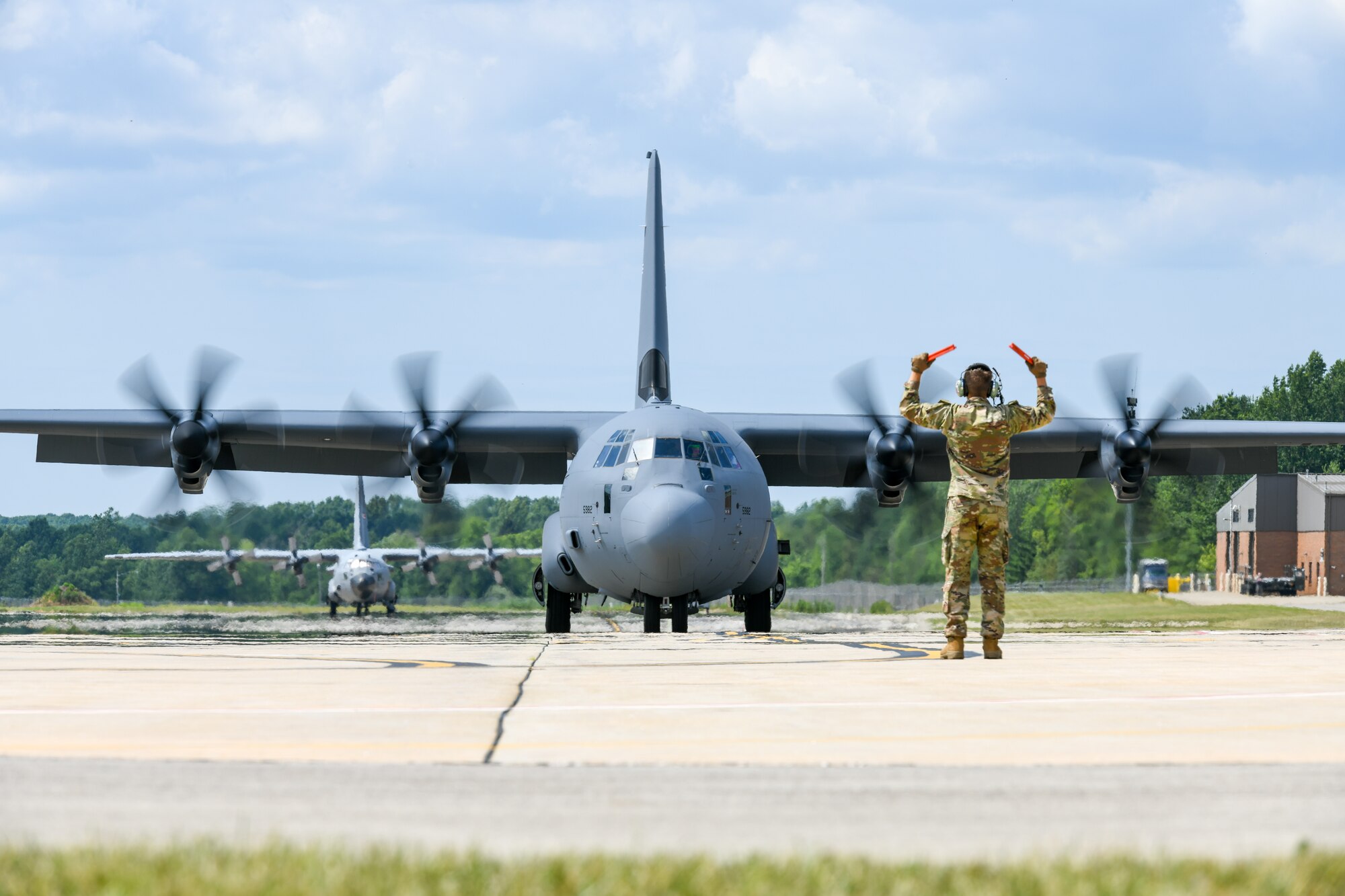 The 910th Airlift Wing’s first C-130J-30 Super Hercules aircraft is marshalled to its arrival ceremony, on July 16, 2024, at Youngstown Air Reserve Station, Ohio.