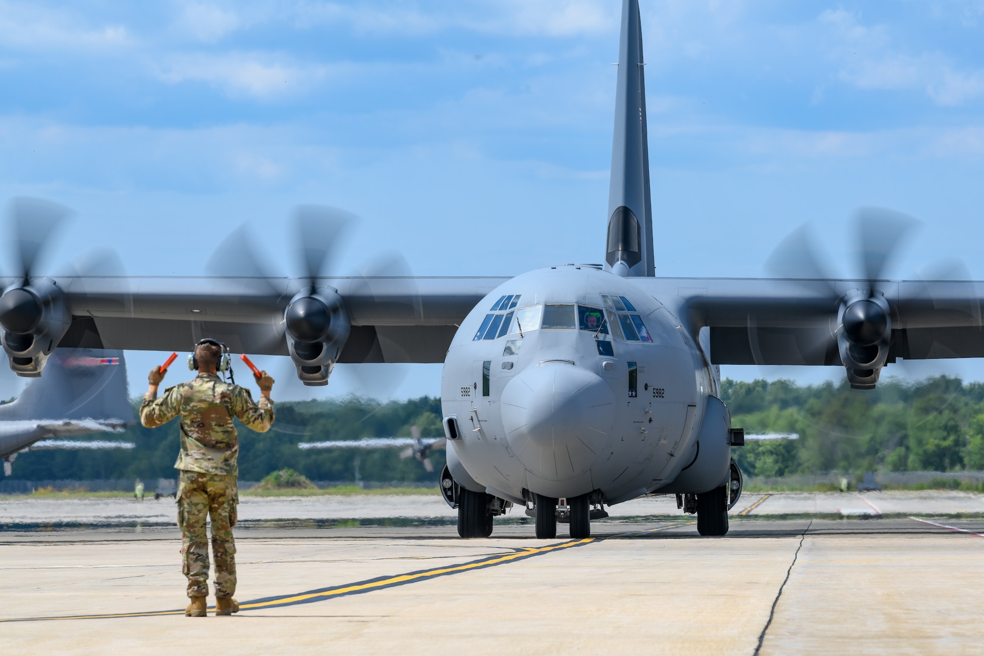 The 910th Airlift Wing’s first C-130J-30 Super Hercules aircraft is marshalled to its arrival ceremony, on July 16, 2024, at Youngstown Air Reserve Station, Ohio.