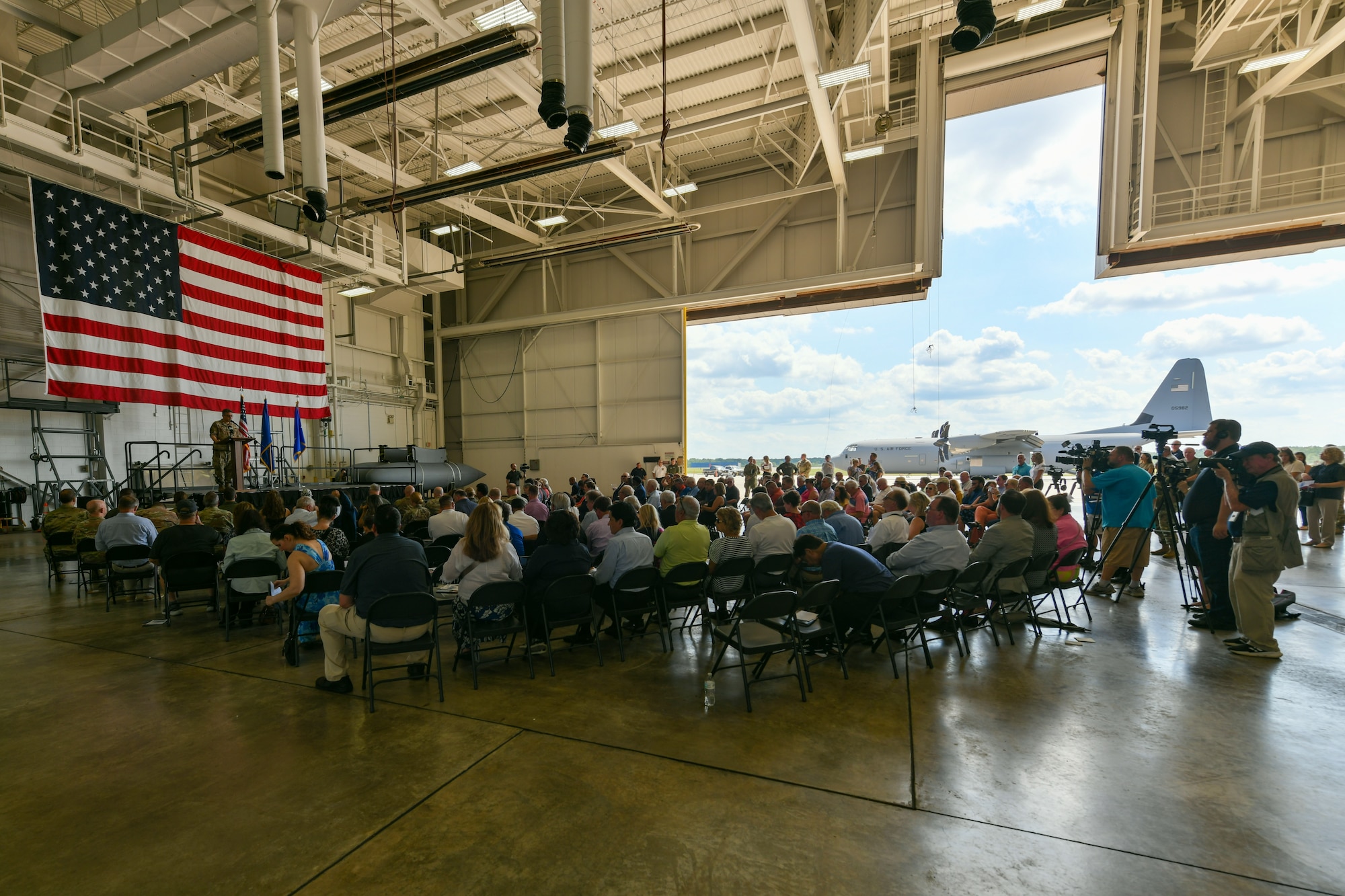 Senior Master Sgt. Bob Barko Jr., the superintendent of the 910th Airlift Wing Public Affairs office, speaks at an arrival ceremony celebrating the 910th AW’s first C-130J-30 Super Hercules aircraft debuted on July 16, 2024, at Youngstown Air Reserve Station, Ohio.