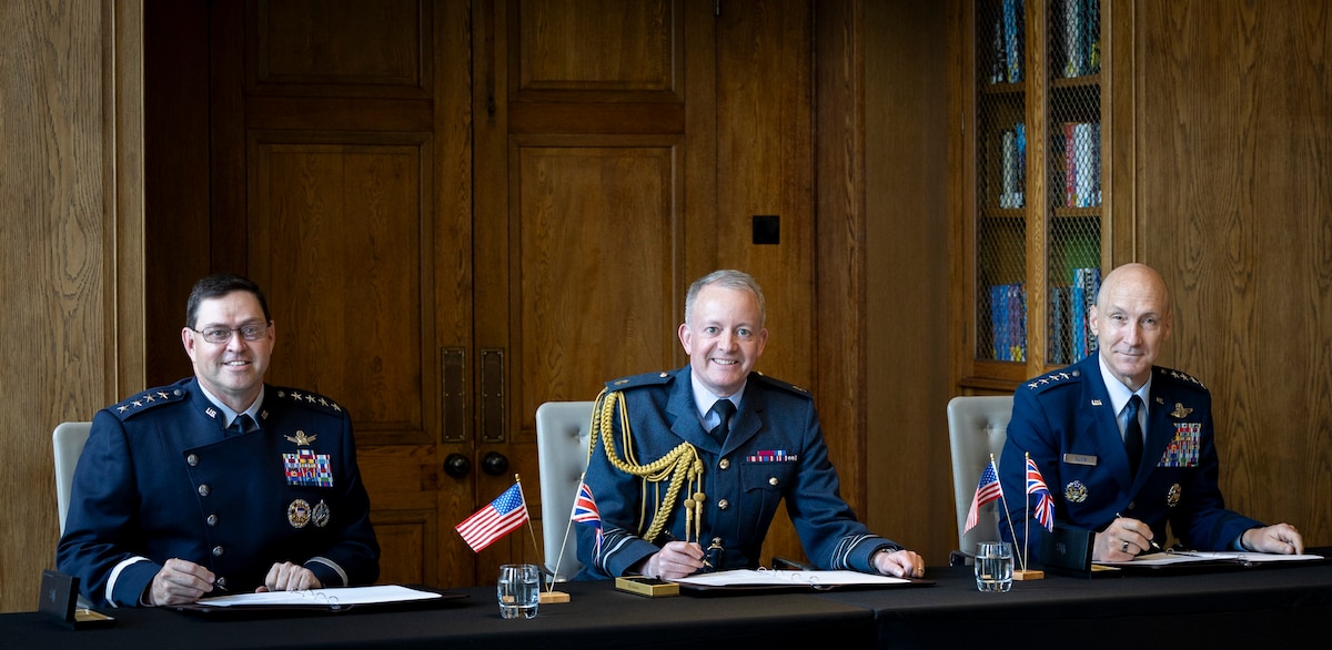U.S. Space Force Chief of Space Operations Gen. Chance Saltzman, Royal Air Force Chief of the Air Staff Air Chief Marshal Sir Rich Knighton, and U.S. Air Force Chief of Staff Gen. David Allvin sign a Shared Vision Statement on Combined Air and Space Power in the 21st Century at the RAF’s Global Air & Space Chiefs’ Conference in London, United Kingdom, July 17, 2024