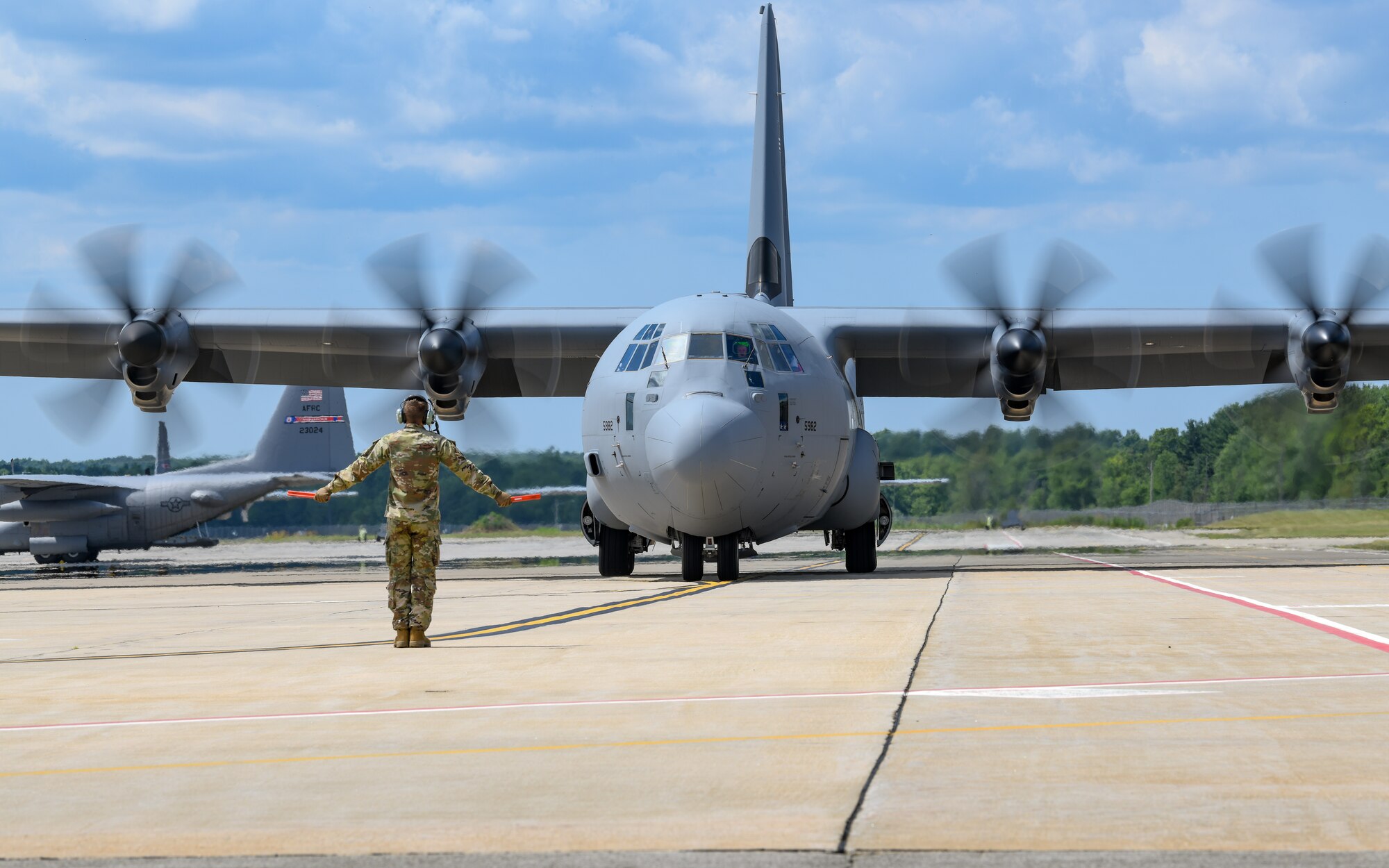 The 910th Airlift Wing’s first C-130J-30 Super Hercules aircraft is marshalled to its arrival ceremony, on July 16, 2024, at Youngstown Air Reserve Station, Ohio.