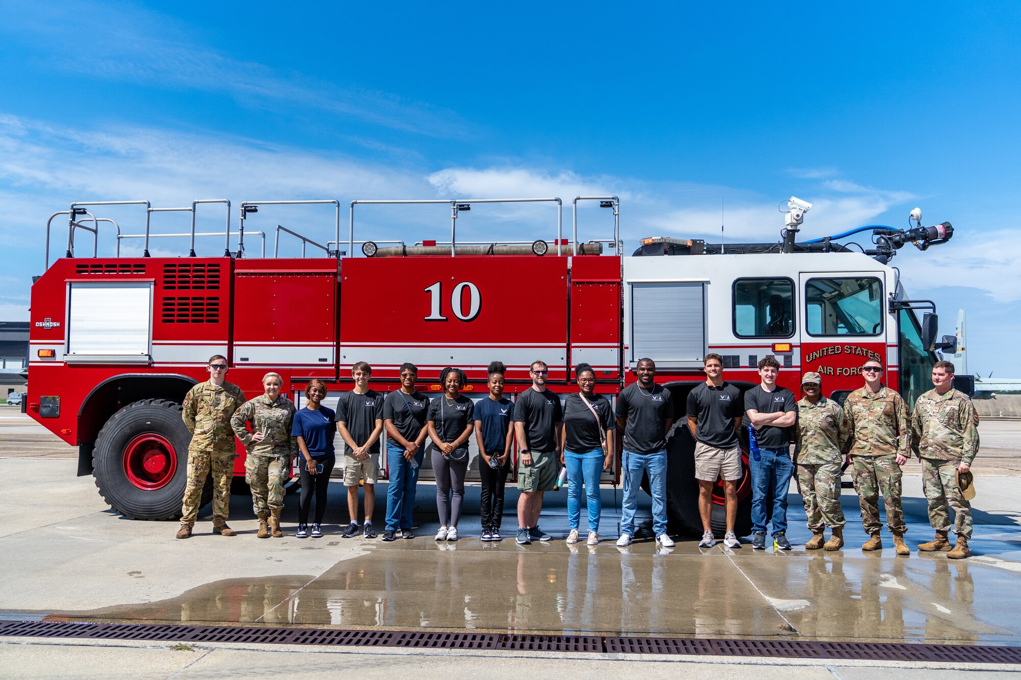 Enlistees assigned to the 331st Recruiting Squadron delayed entry program pose for a group photo at the Fire Station during their tour of Keesler Air Force Base, Mississippi, July 11, 2024. These future Airmen and Guardians received the tour to better understand the various career fields within the Air Force and Space Force. (U.S. Air Force photo by Andrew Young)
