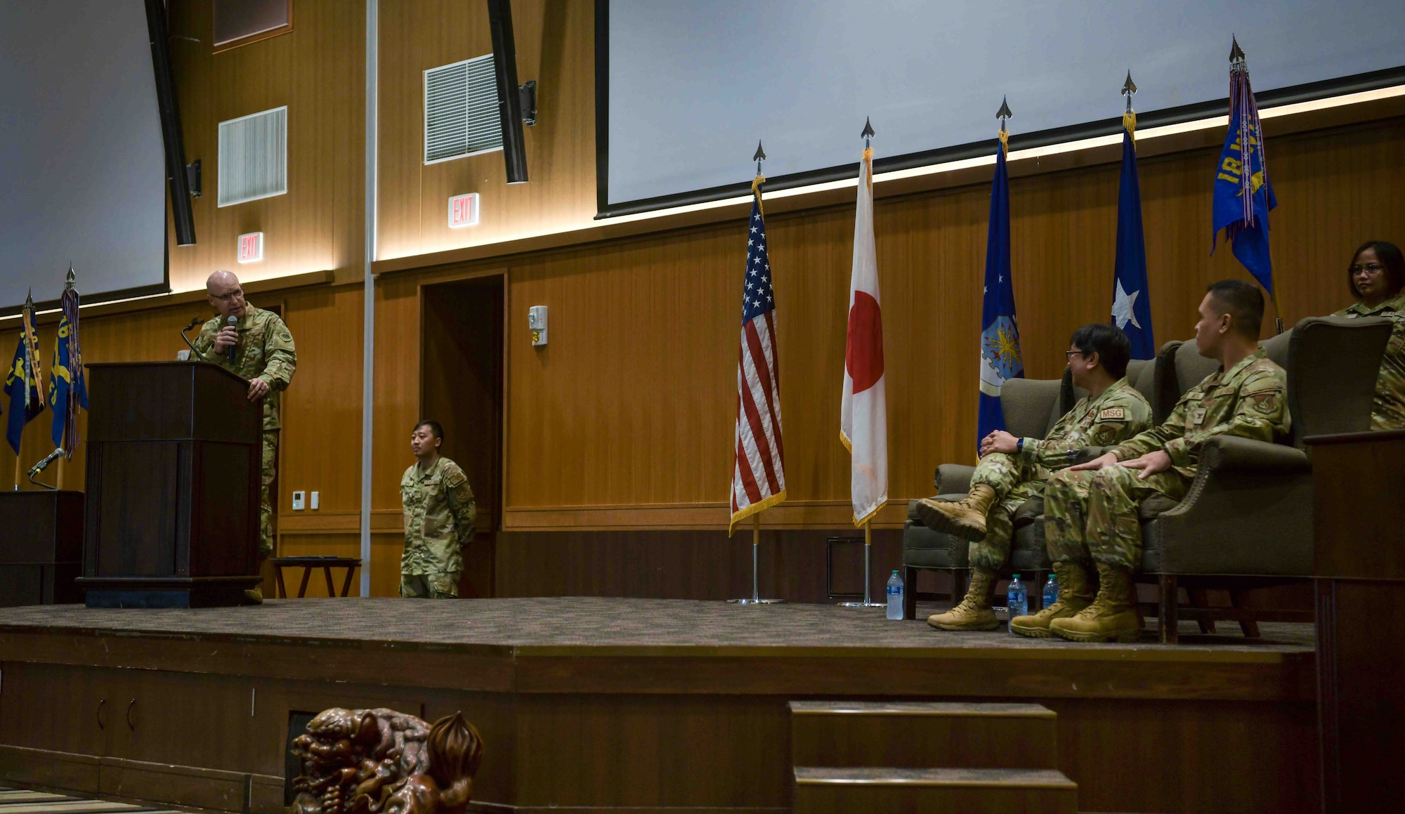 U.S. Air Force Brig. Gen. Nicholas Evans, left, 18th Wing commander, acknowledges Col. Laura Ramos, outgoing 18th Mission Support Group commander, and Col. Robinson Mata, right, incoming 18th MSG commander, during the 18th MSG change of command ceremony at Kadena Air Base, Japan, July, 18, 2024.