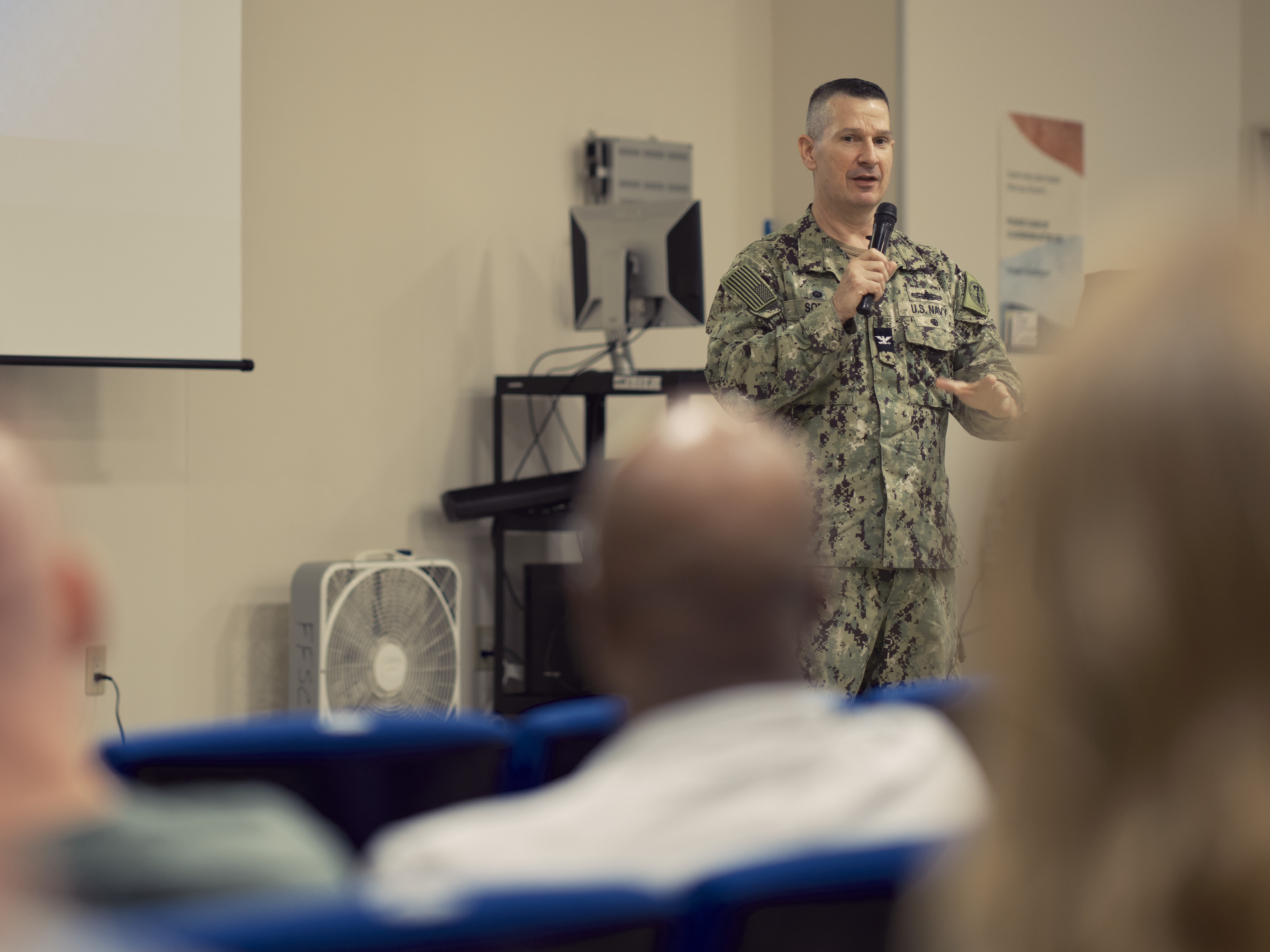 Capt. Les Sobol, Commander, Fleet Activities Yokosuka, takes questions from area ombudsmen and local leadership at an Ombudsman Assembly July 10, 2024 in the installation's Community Readiness Center.