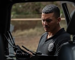 U.S. Army Sgt. 1st Class Daniel F. Billingsley, communications chief, 33rd Weapons of Mass Destruction-Civil Support Team, tests radio transmissions during a training exercise in Lihue, Hawaii, June 7, 2024. The exercise included military and civilian response partners to better integrate capabilities when disaster strikes.