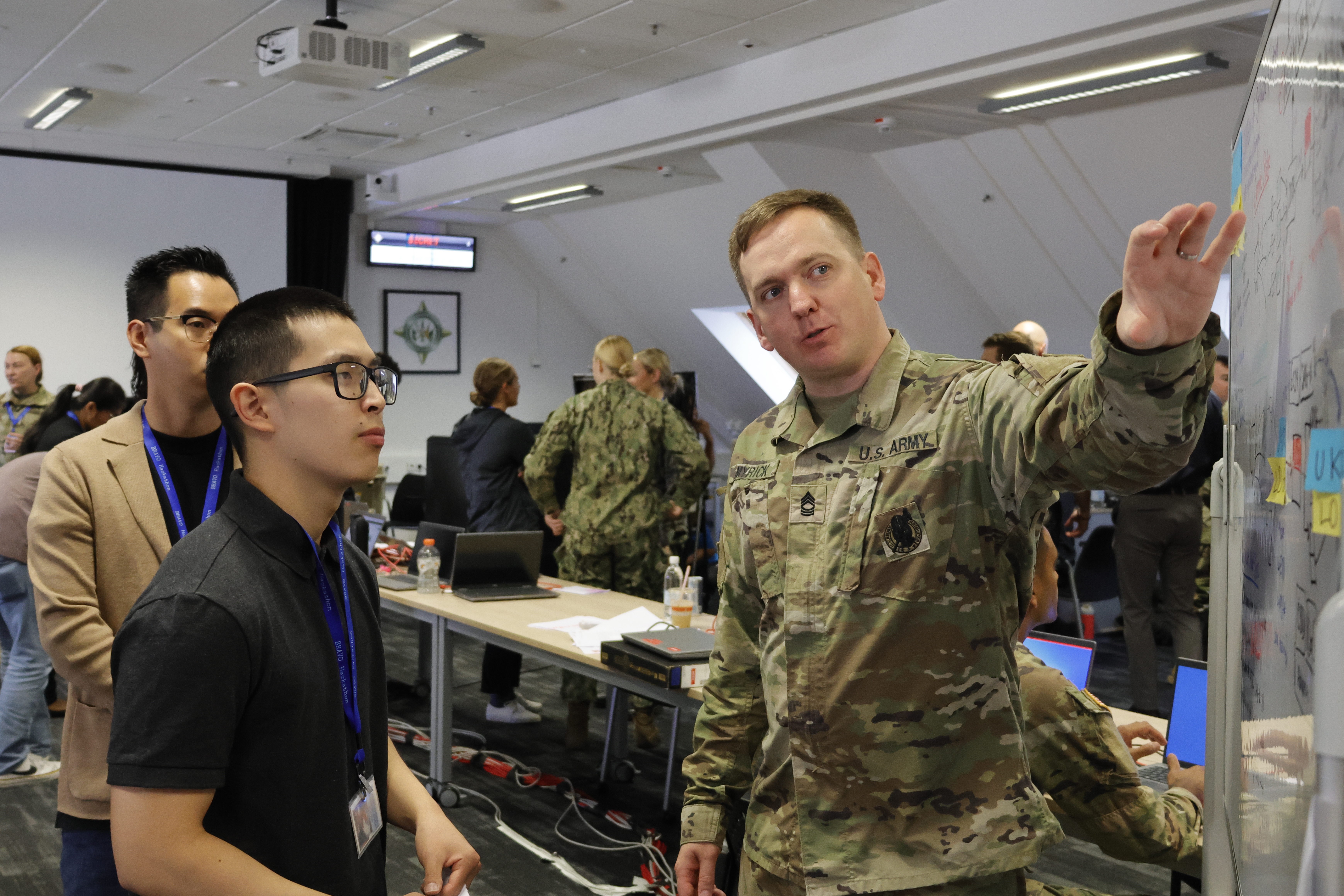 More than 250 data scientists, coders and developers referred to as “hackers,” gathered to develop prototypes within set timeframes to initiate and validate innovative concepts in Stuttgart Germany, June 7, 2024. BRAVO Hackathons, sponsored by senior Department of Defense leaders, foster innovative environments where government and industry collaborate to test bold ideas using real DOD data.
