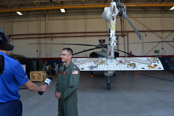 HSC-9 showcase traditional naval tattoos on their ceremonial aircraft.