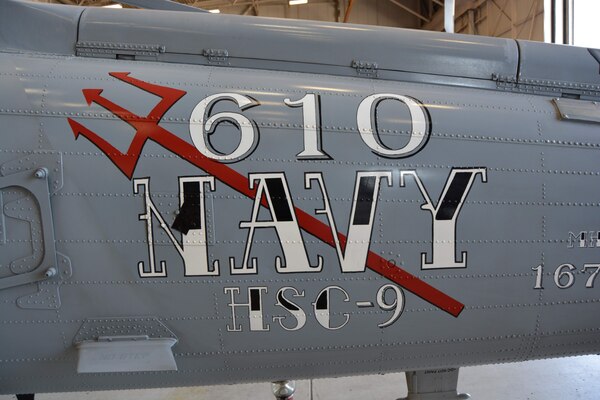 HSC-9 showcase traditional naval tattoos on their ceremonial aircraft.