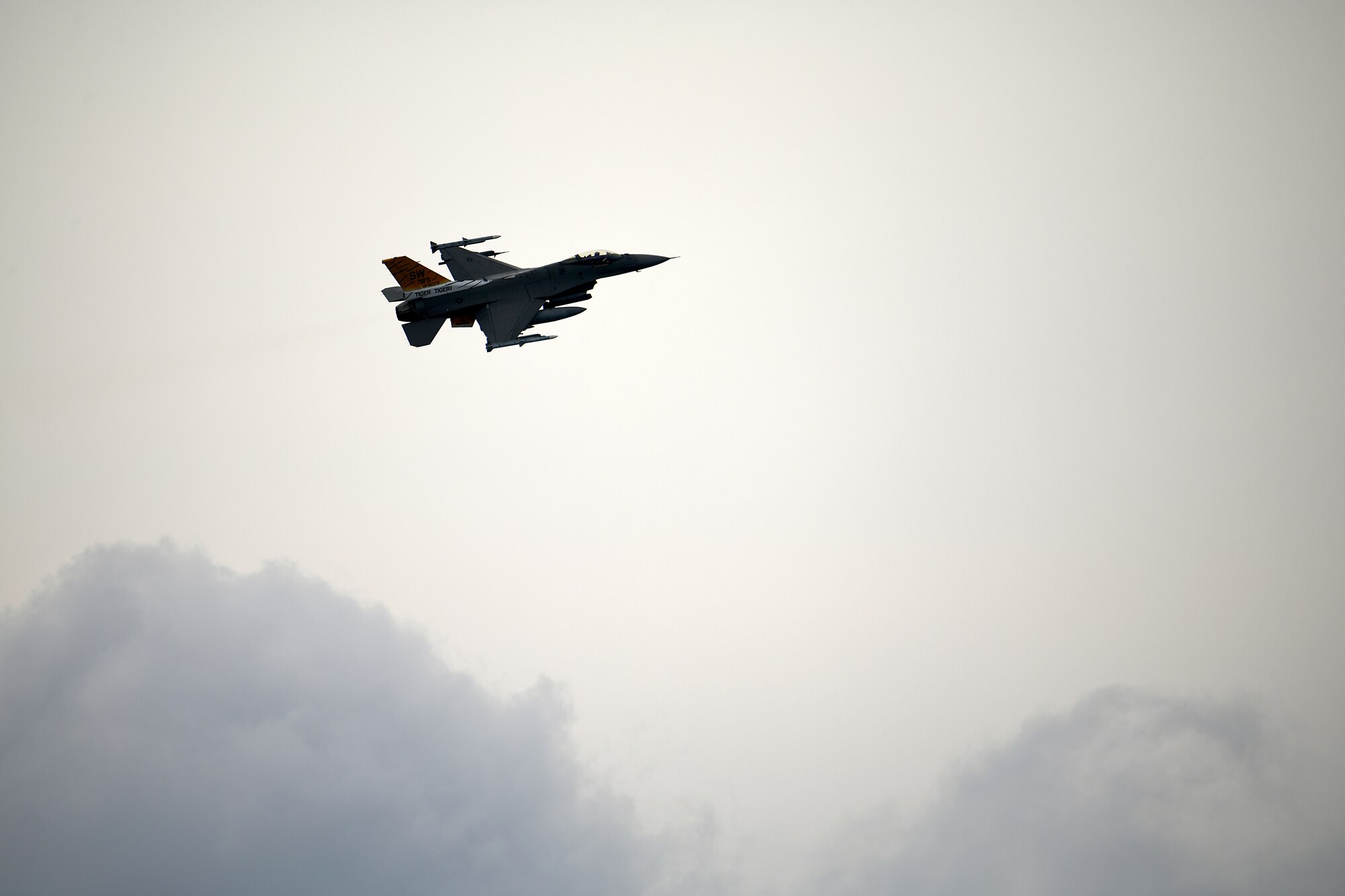 A U.S. Air Force F-16C Fighting Falcon assigned to the 79th Fighter Squadron participates in intercept training over South Carolina, June 27, 2024. The week-long training partnered pilots and aircraft from the 79th FS and Civil Air Patrol, aiming to teach and expand upon infrequently-used skills such as flying slower than the F-16’s normal tactical speeds and utilizing communications-out visual signals. (U.S. Air Force photo by Staff Sgt. Kelsey Owen)