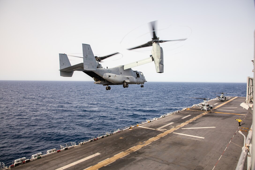 A U.S. Marine Corps MV-22B Osprey tiltrotor aircraft with Marine Medium Tiltrotor Squadron 365 (Reinforced), 24th Marine Expeditionary Unit (MEU) Special Operations Capable (SOC), takes off from the amphibious assault ship USS Wasp (LHD 1) during routine flight operations while underway in the Mediterranean Sea, June 28, 2024. The Wasp Amphibious Ready Group-24th MEU (SOC) is conducting operations in U.S. Naval Forces Europe area of operations to support high-end warfighting exercises while demonstrating speed and agility operating in a dynamic security environment. (U.S. Marine Corps photo by Gunnery Sgt. Hector de Jesus)