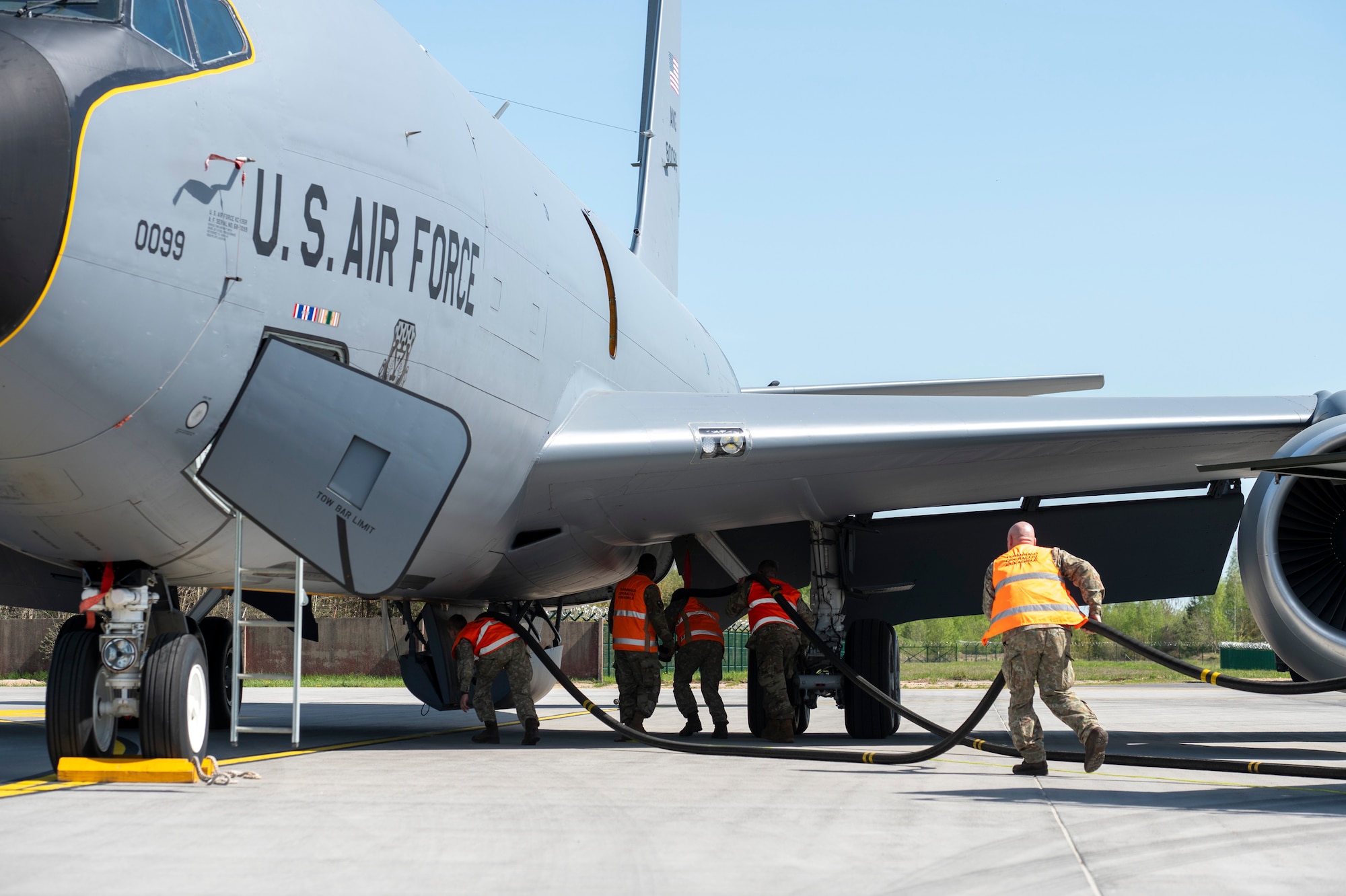 Two members from the 171st Air Refueling Wing, Pennsylvania Air National Guard, share best practices about hot pit refueling on a KC-135 Stratotanker aircraft with the Lithuanian Air Force during the most recent State Partnership Program engagement May 2, 2024, in Siauliai, Lithuania. Pennsylvania and Lithuania have been partner states for over 30 years. (U.S. Air National Guard photo by Tech. Sgt. Zoe M. Wockenfuss)