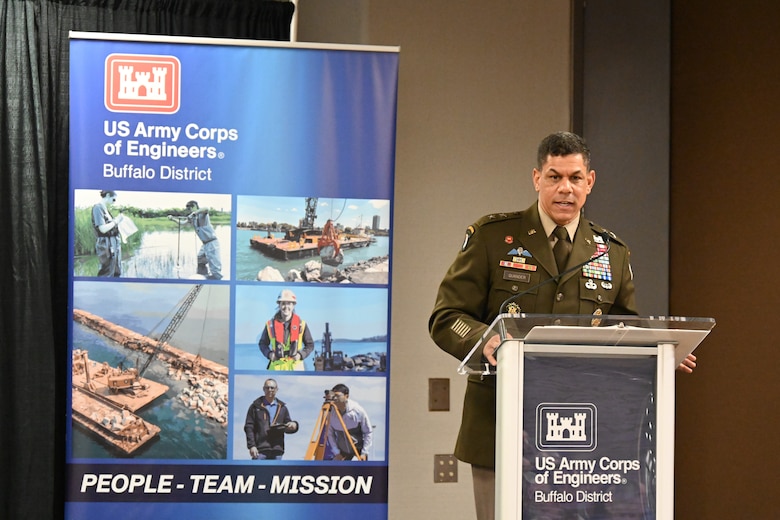 Maj. Gen. Mark Quander speaks from behind a podium