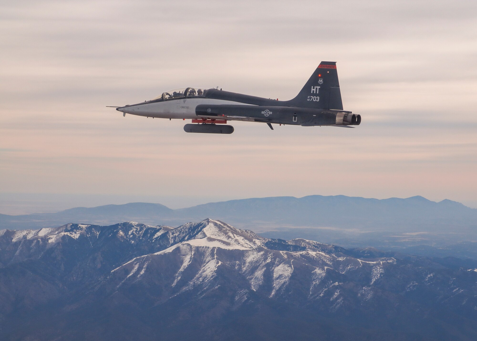 A T-38C with an attached AgilePod flown by Steven Ross, Air Force Test Pilot School Flight Sciences Technical Expert and Instructor Test Pilot, conducts a flight test in the skies over Southern California. (Courtesy photo)