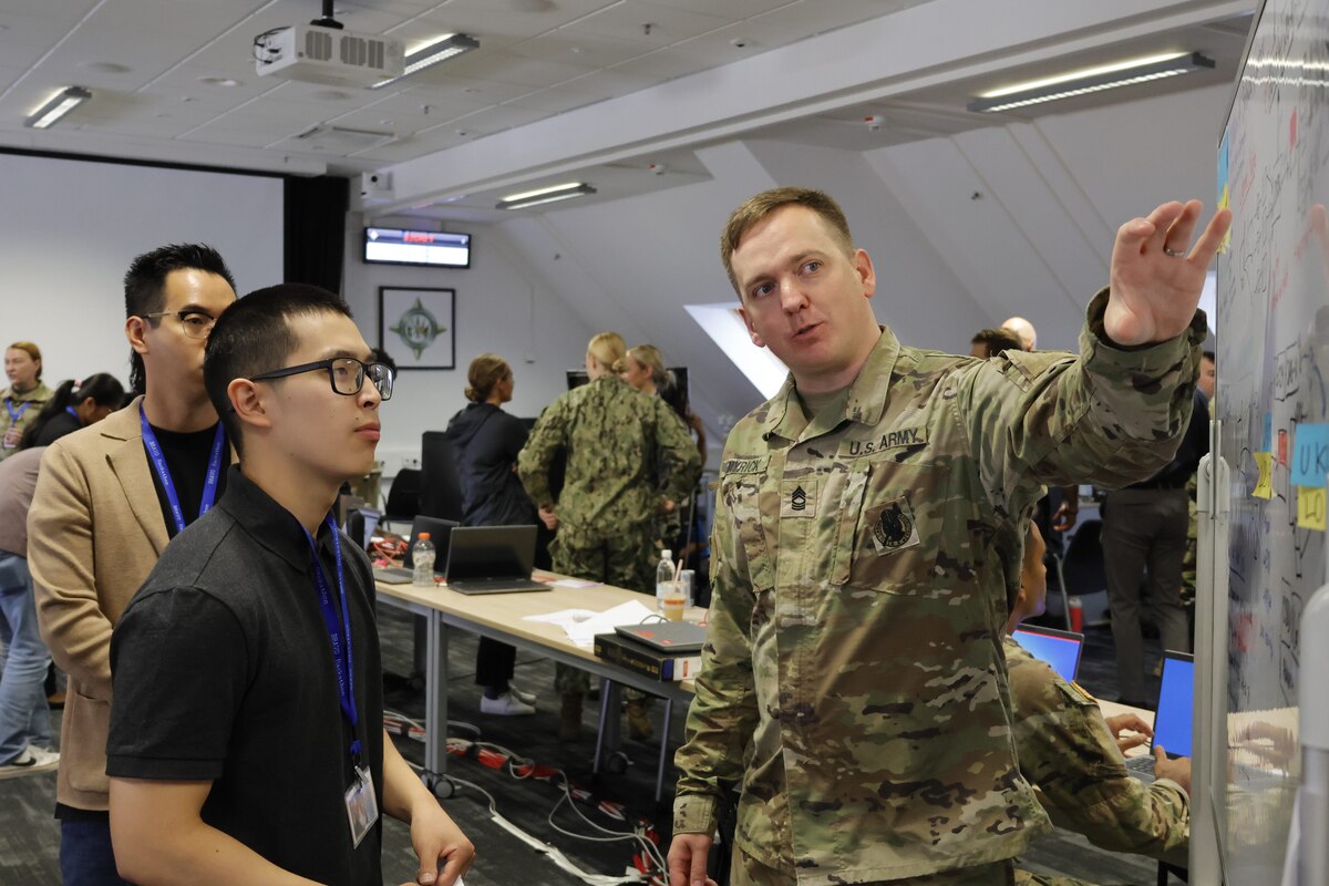 More than 250 data scientists, coders and developers referred to as “hackers,” gathered to develop prototypes within set timeframes to initiate and validate innovative concepts in Stuttgart Germany, June 7, 2024. BRAVO Hackathons, sponsored by senior Department of Defense leaders, foster innovative environments where government and industry collaborate to test bold ideas using real DOD data.