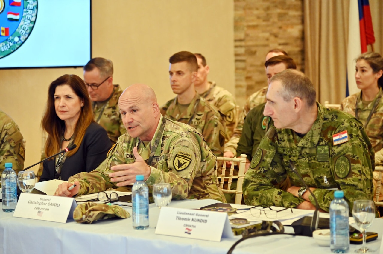 A four-star Army general speaks in what looks like a classroom.