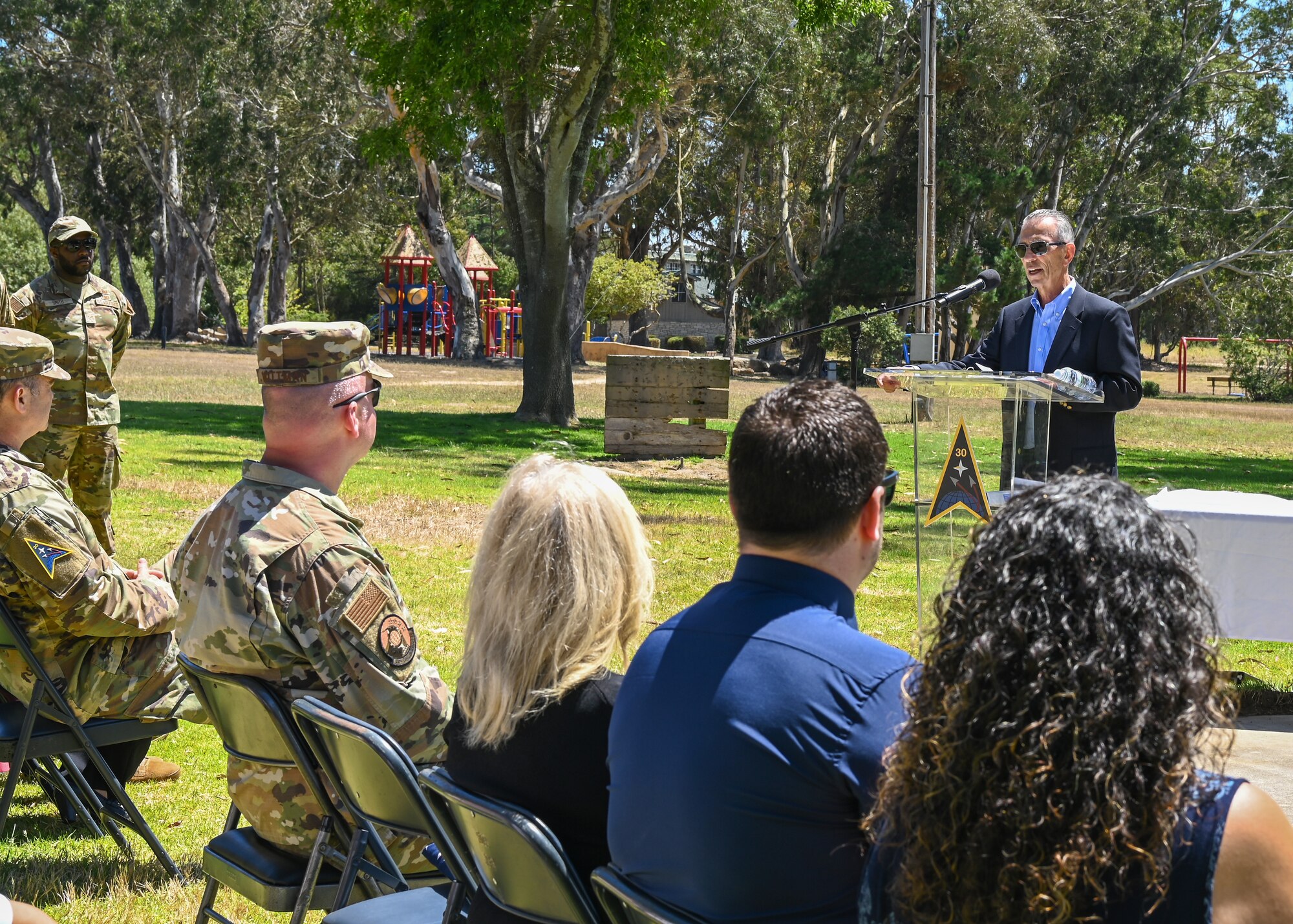The brother of late U.S. Air Force 4392d Civil Engineer Squadron former commander, delivers a speech to the people in attendance during the Cocheo Park Commemoration Ceremony at Vandenberg Space Force Base.