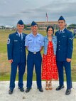 U.S. Air Force Chief Master Sgt. Charles Santos, 9th Medical Group senior enlisted leader (left), A1C Anthony Santos, 81st Medical Group physical therapy technician (center), Adelaida Santos, 9th Communications Squadron commanders administrative assistant, and 1st Class Nicholas Santos, 375th Medical Group physical therapy technician, pose together at A1C Anthony Santos's Basic Military Training graduation at Lackland Air Force Base, Texas, November 9, 2023.