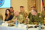 A four-star Army general speaks in what looks like a classroom.