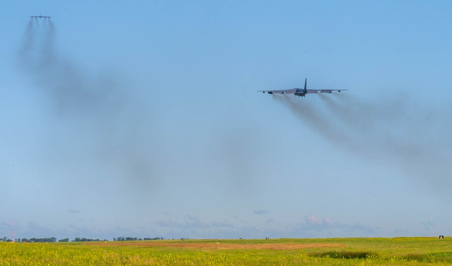 Two B-52H stratofortresses takes off in support of exercise AGILE WARBIRD at at Minot Air Force Base, North Dakota, July 15, 2024. Agile Combat Employment exercises like these sharpen Airmen’s ability to mobilize quickly and ensure they are prepared to operate Minot bombers from anywhere at a moment’s notice. (U.S. Air Force photo by Senior Airman Alexander Nottingham)