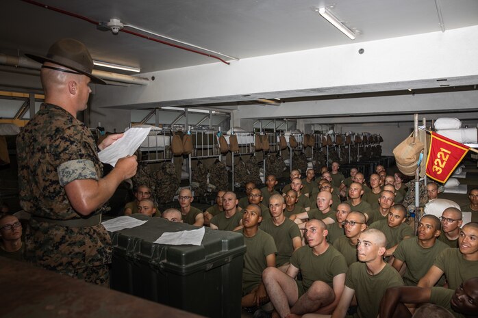 U.S. Marine Corps Staff Sgt. Shawn Mulford, a drill instructor with Kilo Company, 3rd Recruit Training Battalion, teaches Marine Corps knowledge to recruits before the senior drill instructor square away time at Marine Corps Recruit Depot San Diego, California, July 10, 2024.  SDI time is periodically scheduled to enable senior drill instructors the opportunity to address instructional remediation, core values reinforcement, mentorship, coaching and future training preparation. (U.S. Marine Corps photo by Cpl. Sarah M. Grawcock)