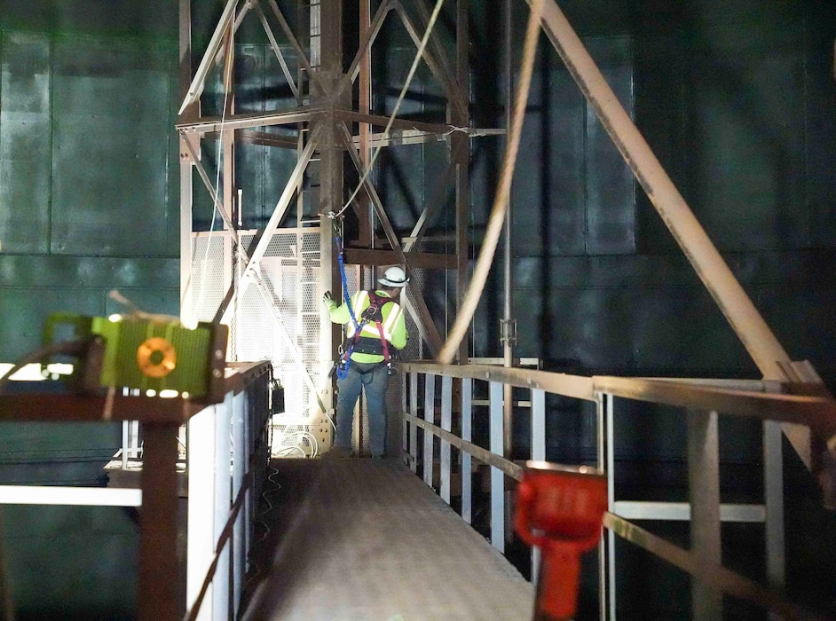 HALAWA, Hawaii (June 25, 2024) A Navy Closure Task Force-Red Hill (NCTF-RH) contractor installs a horizontal lifeline inside fuel tank 8 at the Red Hill Bulk Fuel Storage Facility (RHBFSF) in Halawa, Hawaii, June 25, 2024. The lifeline will be one of three that will allow workers to safely enter and maneuver and begin removing sludge from the interior of the tank. Charged with the safe decommissioning of the RHBFSF, NCTF-RH was established by the Department of the Navy as a commitment to the community and the environment. The Navy continues to engage with the people of Hawaii, regulatory agencies, and other stakeholders as NCTF-RH works to safely and deliberately decommission the RHBFSF. (U.S. Navy photo by Mass Communication Specialist 1st Class Glenn Slaughter)