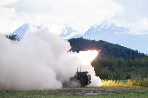 Rockets are launched from a High Mobility Artillery Rocket System at the Donnelly Training Area outside of Fort Greely, Alaska, during exercise Arctic Defender July 15, 2024. Arctic Defender is a German Air Force-led exercise that provides a unique opportunity to integrate various forces into joint, coalition and multilateral training from simulated forward operating bases and is part of several exercises under Pacific Skies 24. Pacific Skies is a combination of several exercises in the Indo-Pacific theater in which German, French and Spanish air forces participate with U.S. forces. (U.S. Air Force photo by Staff Sgt. Derek Seifert)