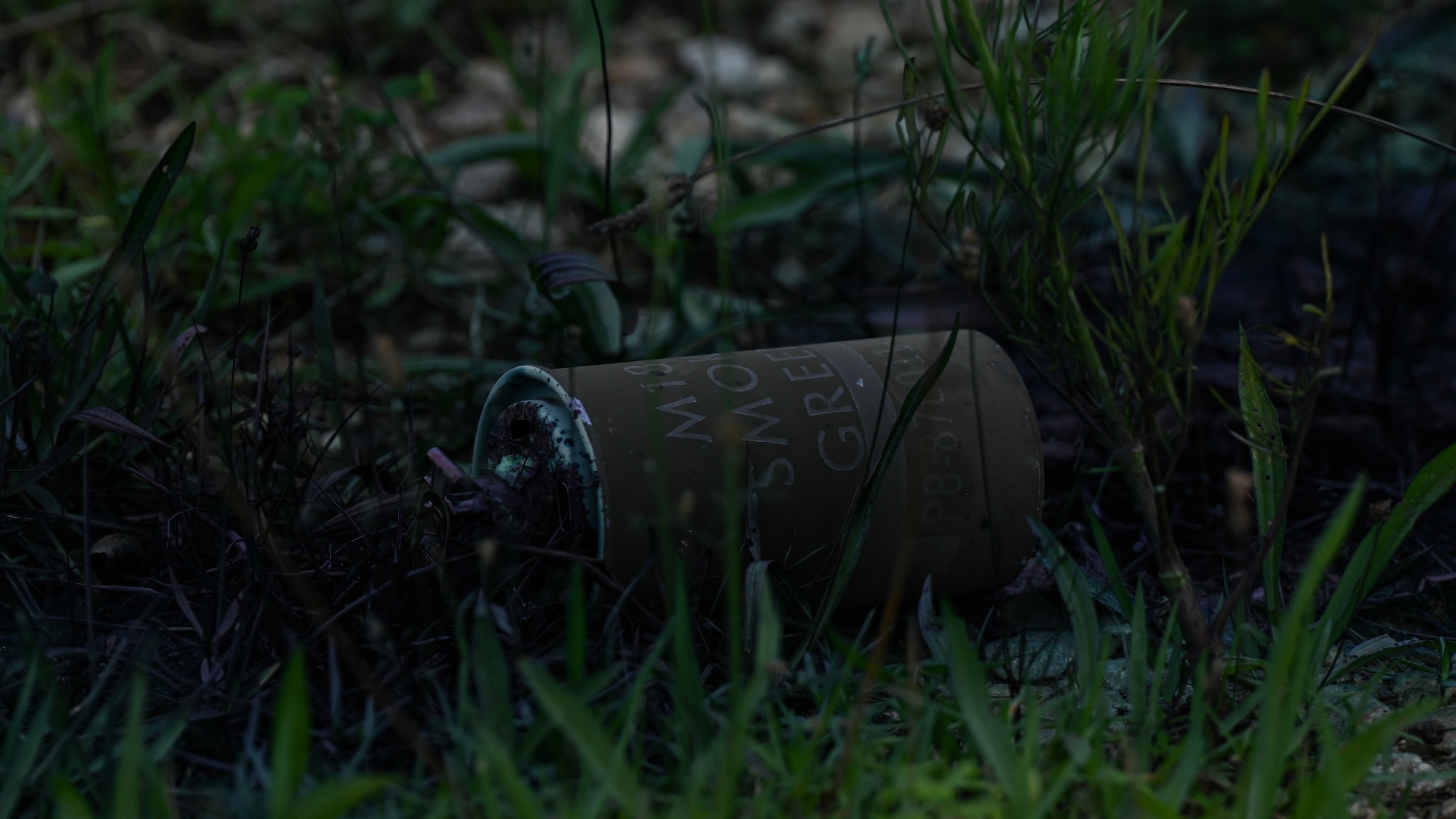 An M18 smoke grenade used by the 8th Security Forces Squadron during a simulated ground attack for exercise Beverly Sentinel 24-2.